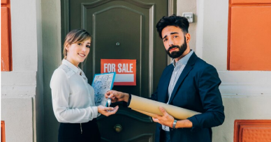 A man and woman stand by a door marked "buyer's agent," symbolizing their focus on immigration consulting in Chennai.